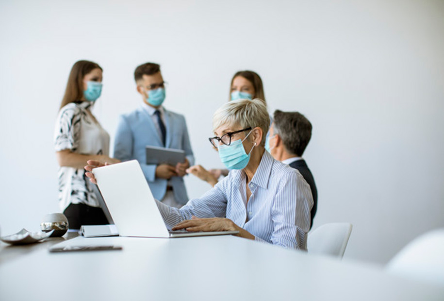 group-of-business-people-have-a-meeting-and-working-in-the-office-and-wear-masks-as-protection-from-corona-virus_52137-33901