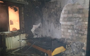 В Витебске при пожаре в многоэтажке спасли женщину